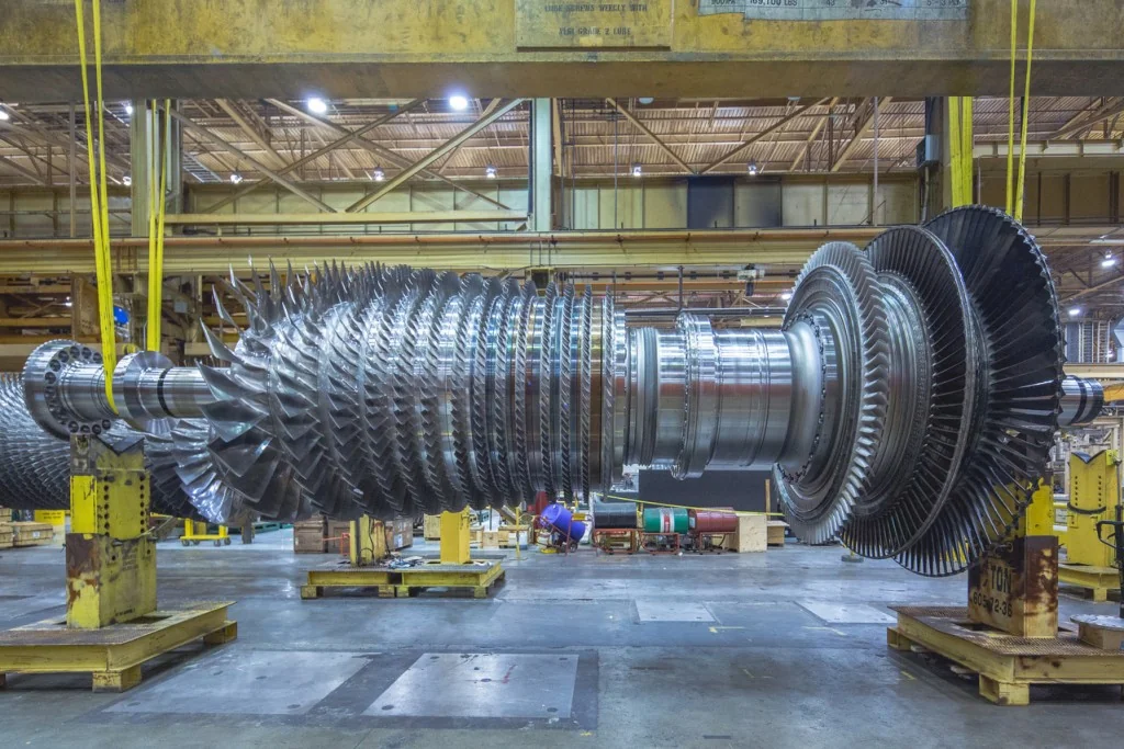 Illustrative gas turbine rotor inside a manufacturing facility